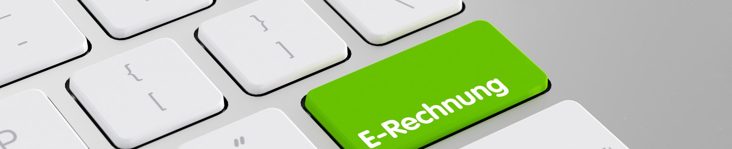Eine Tastatur worauf eine Taste mit E-Rechnung abgebildet ist.